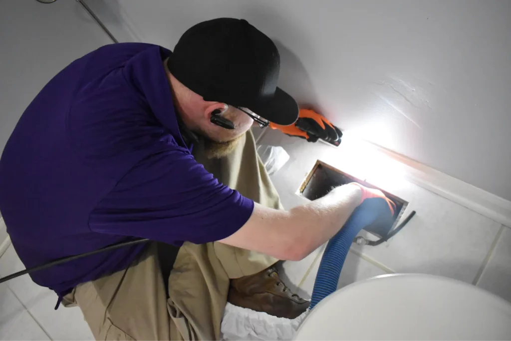 Professional hired to perform Air duct cleaning services