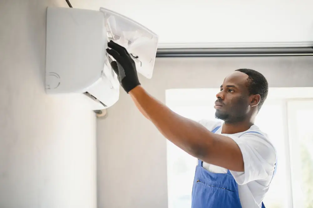 Professional technician working a Air Duct Cleaning Wheaton IL service