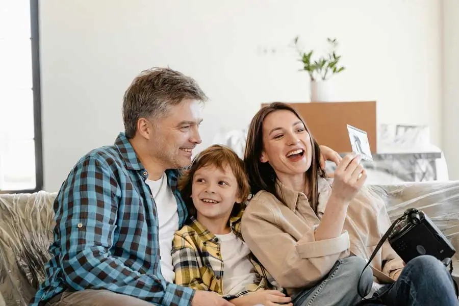 Professional technician cleaning air ducts in Chicagoland home